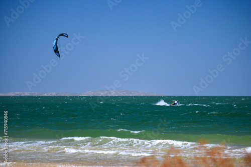 Sea, kitesurfing, sunny day, sea sports, turquoise water color