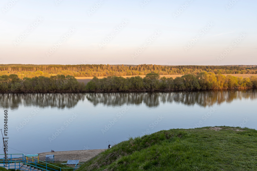 May landscape view of a wide river from an observation deck.