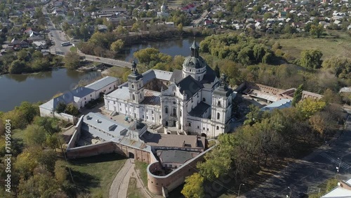 Aerial drone autumn footage of Monastery of the Bare Carmelites in Berdychiv, historic city in Zhytomyr Oblast, northern Ukraine.  Travel destinations across Ukraine photo