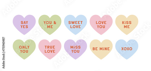 Cute set of hand drawn vector candy hearts isolated on white background. Lovely pastel conversation hearts for Valentines day, festive design, romantic holidays. Charming elements in flat style