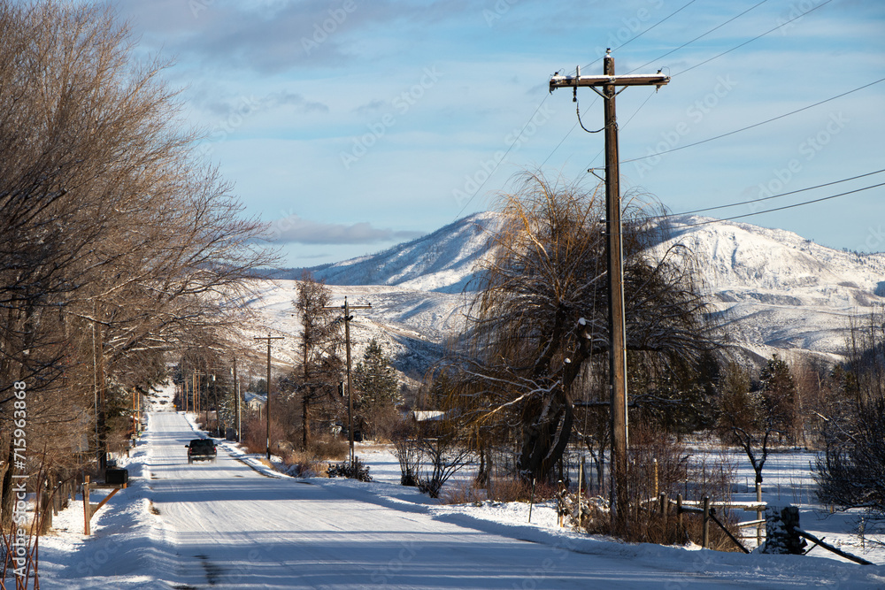 Snow-covered road in the mountains - Methow Valley, Washington, USA (Winter) Snow-covered road in the mountains - Methow Valley, Washington, USA (Winter)