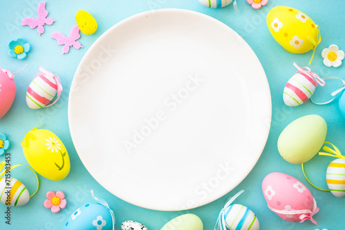 Canvas Print Easter table setting with white plate and decorations, Easter food background