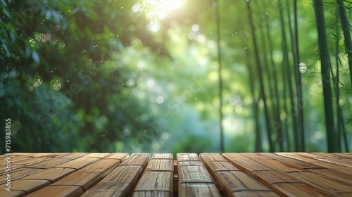 Bamboo smooth boards on defocused natural background of bamboo green forest for placement and display of products  copy space