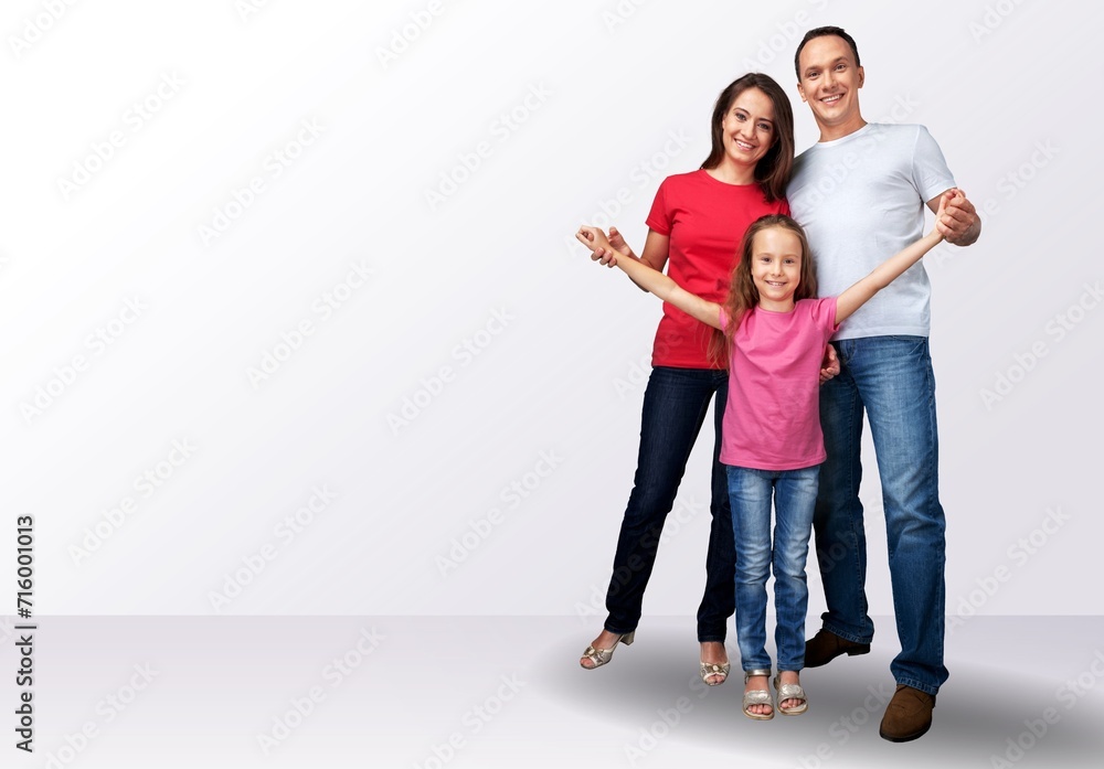 young joyful parents with children posing on background young joyful parents with children posing on background