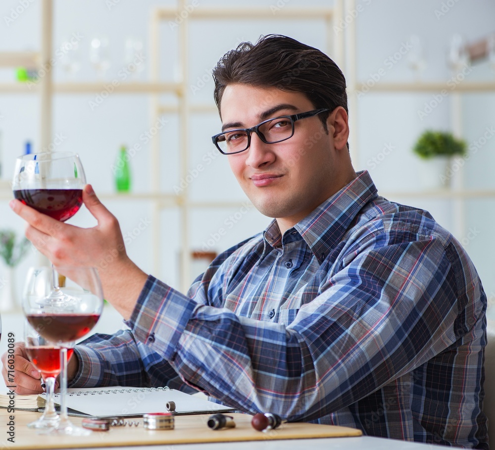 Professional sommelier tasting red wine Professional sommelier tasting red wine