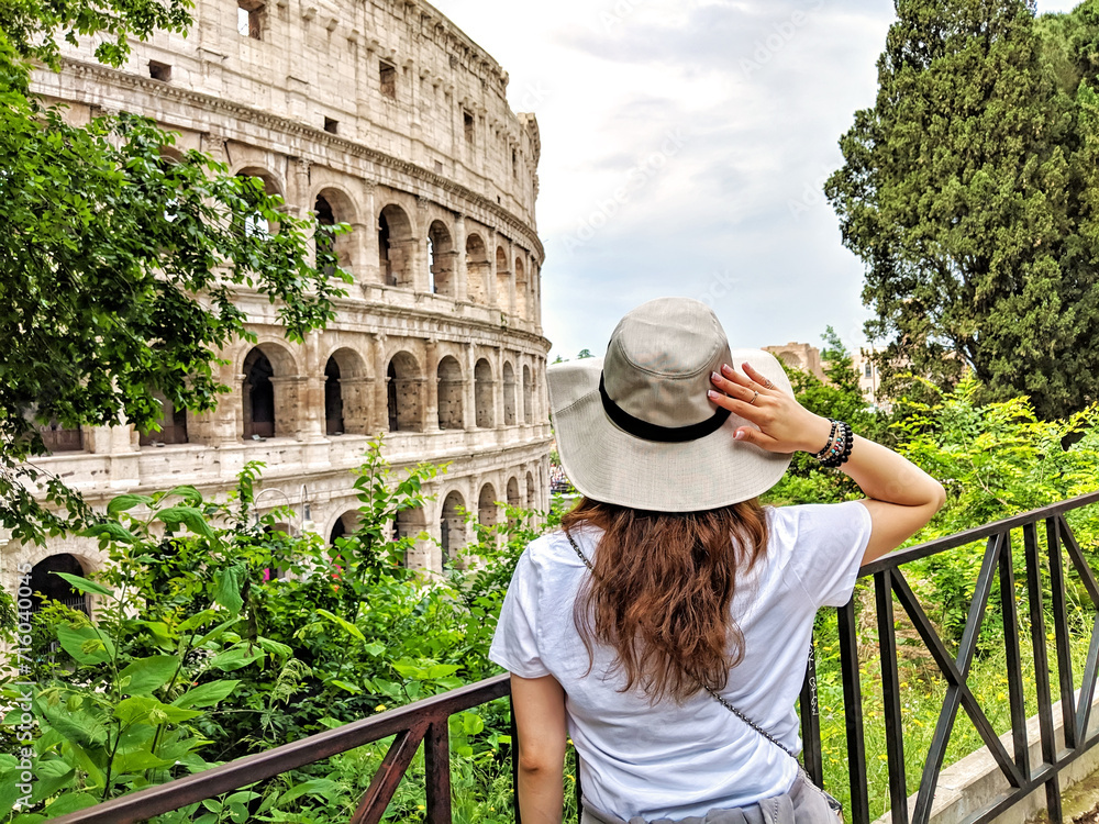 Wanderlust Travelling Girl in front of Roman Colosseum and Italian View in Rome, Italy