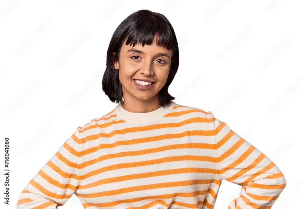 Young Hispanic woman with short black hair in studio confident keeping hands on hips. Young Hispanic woman with short black hair in studio confident keeping hands on hips.