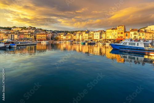 Valokuva A dramatic sky at golden hour sunset above the seaside fishing village and resort town of Cassis, France, in the Provence Cote d'Azur region of Southern France