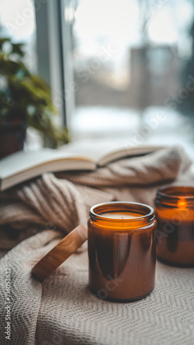 Burning candle in a cozy home interior