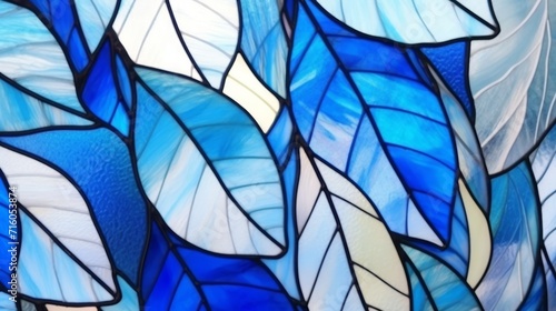 Stained glass window background with blue and white leaf abstract.