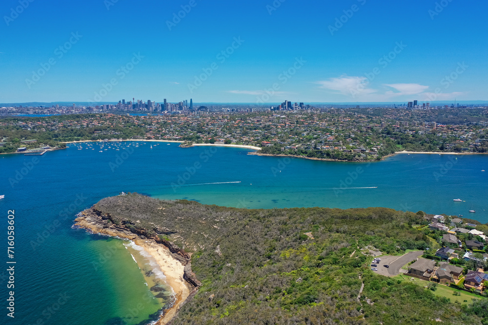 High angle aerial drone view of Balmoral Beach and Edwards Beach in the suburb of Mosman, Sydney, New South Wales, Australia. CBD, North Sydney and Chatswood in the background, Grotto Point High angle aerial drone view of Balmoral Beach and Edwards Beach in the suburb of Mosman, Sydney, New South Wales, Australia. CBD, North Sydney and Chatswood in the background, Grotto Point