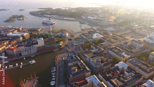  Aerial drone view to the city center, Market Square and Helsinki Cathedral. Ferry is departing from a town photo