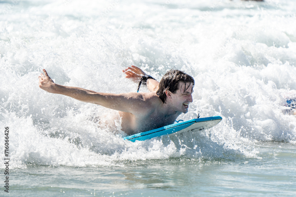 surfing on the beach in hawaii 