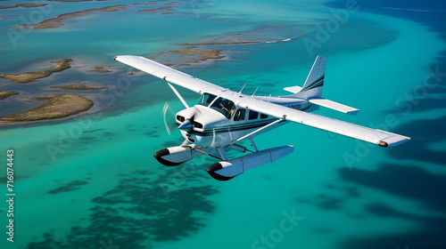 Cessna plane offers aerial view Florida Keys with turquoise waters and coral reefs clearly visible photo