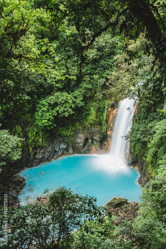 Rio Celeste turquoise waterfall in the green rainforest, Tenorio Volcano National Park, Costa Rica photo