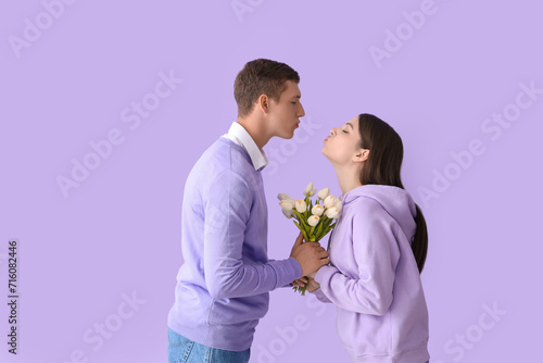 Happy young couple with tul...