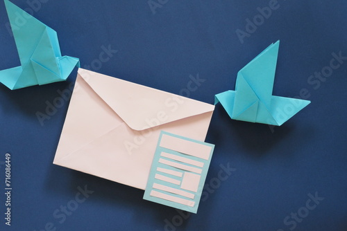 Photography Two birds paper origami carrying letter envelope