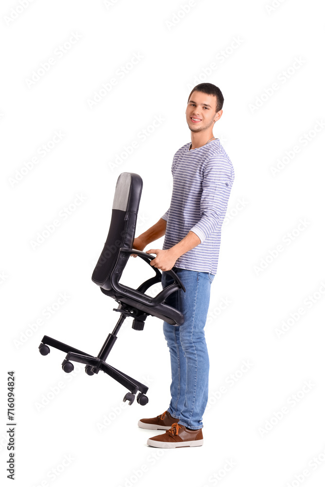 Young man carrying office chair on white background Young man carrying office chair on white background