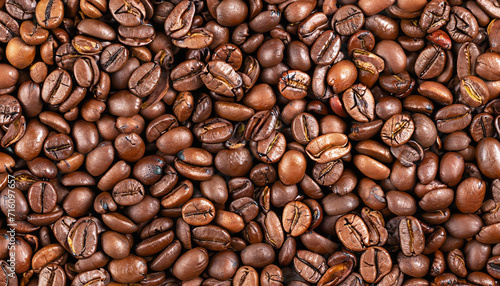 Top view of brown roasted coffee beans, can be use as background, copy space for text. High quality photo