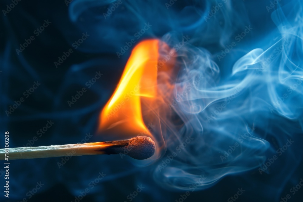 Match ignites and produces smoke