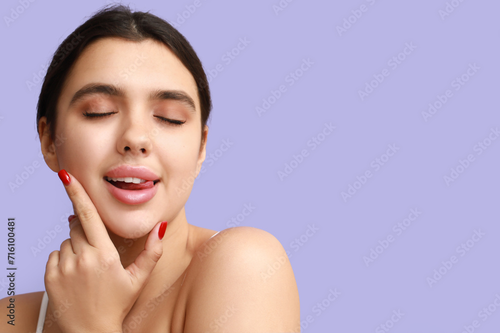 Young woman with beautiful lips on lilac background, closeup Young woman with beautiful lips on lilac background, closeup