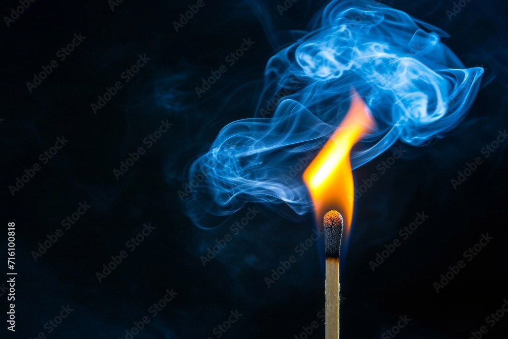 Match being ignited isolated on black background Match being ignited isolated on black background