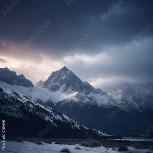 Snow covered mountains in winter  snow kissed mountains capture the mysterious essence of dawn under a cloudy rainy sky