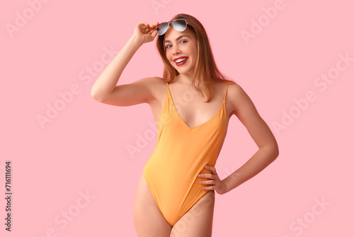 Beautiful young woman in ta...