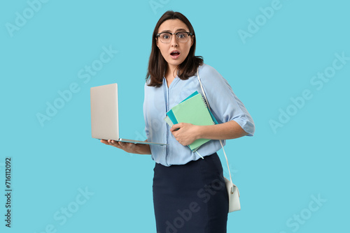Surprised businesswoman wit...
