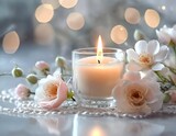 Elegant White Roses and Candlelight for a Relaxing Night a candle and some flowers on a table