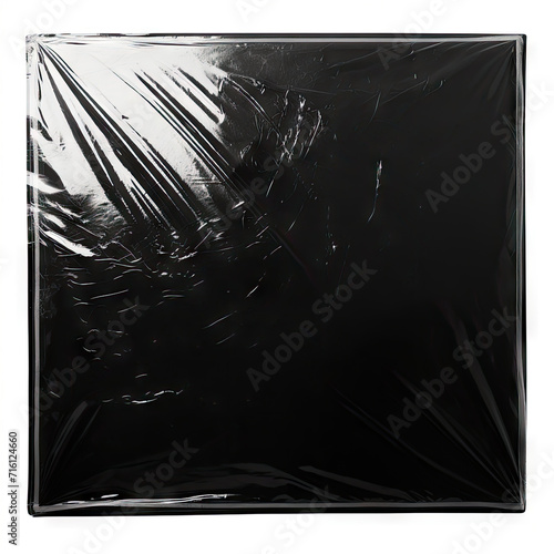 Black vinyl record album cover wrapped in transparent plastic  isolated on white background photo
