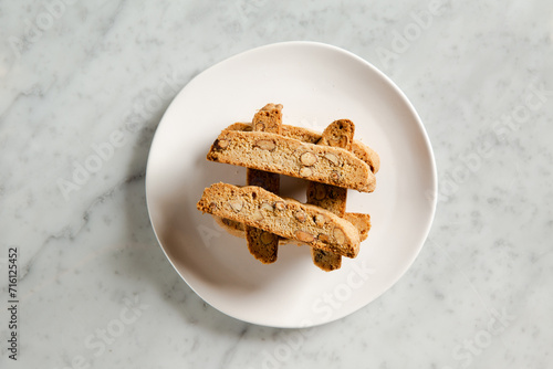 Biscottis on a white plate from above photo