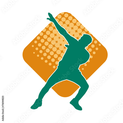 Silhouette of a man in dancing pose. Silhouette of a male dancer in performing pose.