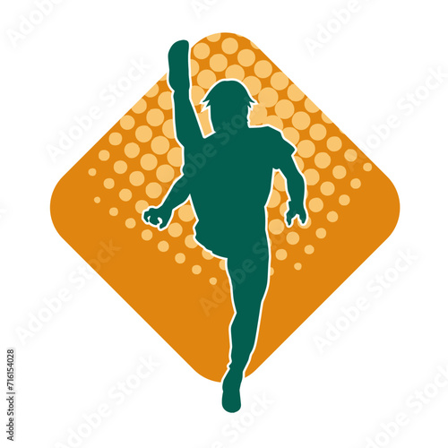 Silhouette of a male model doing martial art kick pose. Silhouette of a martial art kicking pose.