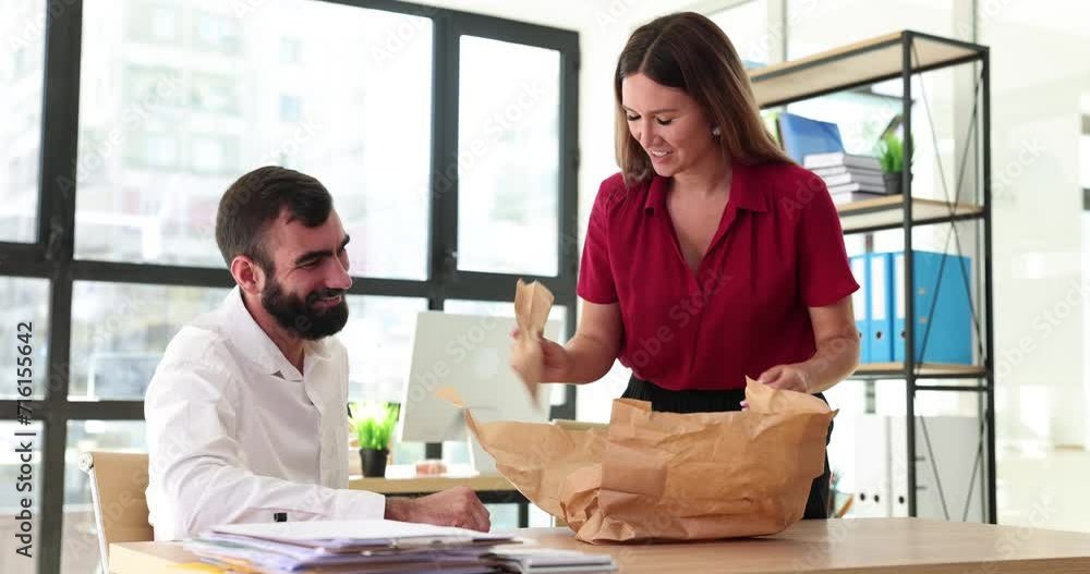 Managers colleagues order food delivery to office Managers colleagues order food delivery to office