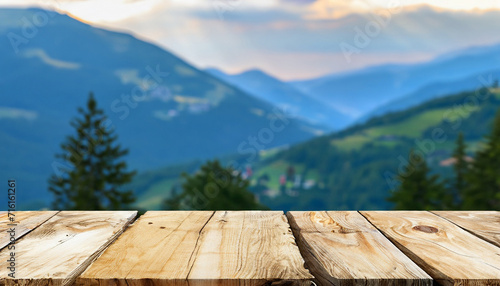 Empty wooden table on the background of scenic mountain Alpine landscape. Template for montage. High quality photo