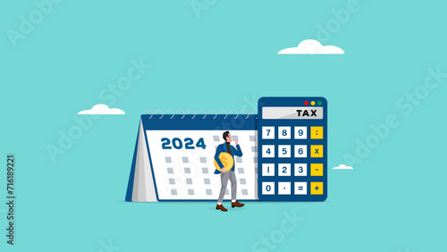 annual income tax filing, Doing taxes accounting and annual financial paperwork, tax form or annual notification of monthly duty and debt, businessman standing near a big calculator tax and calender photo
