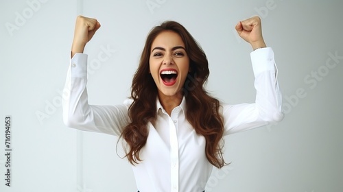 An enthusiastic businesswoman with arms raised in office, pure white background photography, medium close up shot, 8k,hyper quality with generative ai