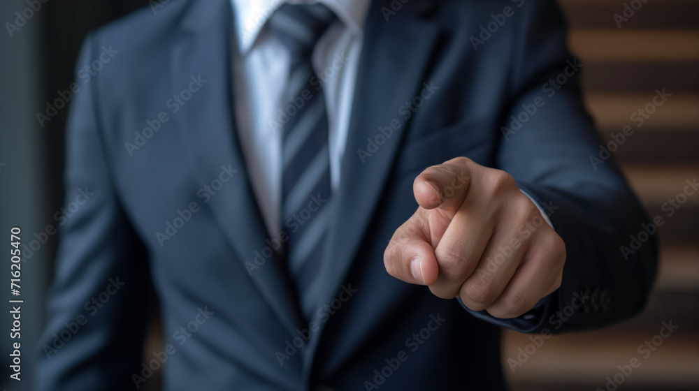 Businessman pointing, giving command, using his hand to show agreement and success. Businessman pointing, giving command, using his hand to show agreement and success.