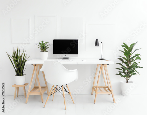 office with table, chair, computer on the table and plant isolated on white