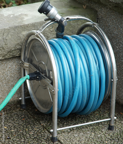 Garden Care Watering Rolled Blue Vinyl Hose photo