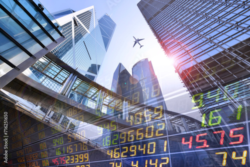 Foto Stock Market Exchange on a skyscraper in Hong Kong background.