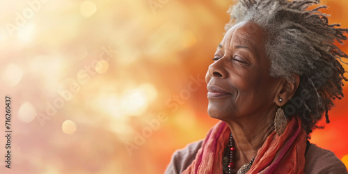 African American woman with healing energy and light around feeling good breathing calm peace. Happy black male in zen calmness taking deep breath for zen, health or spiritual wellness.