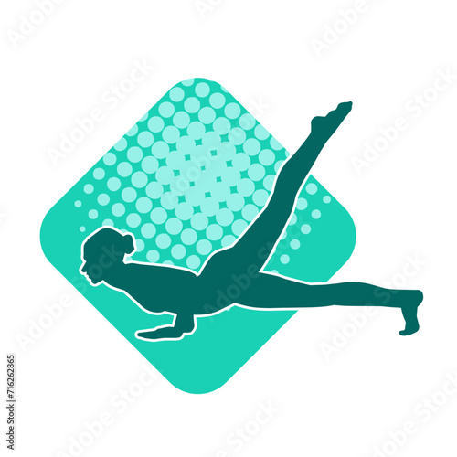 Silhouette of slim female doing exercise. Silhouette of a sporty woman doing gym workout pose. 