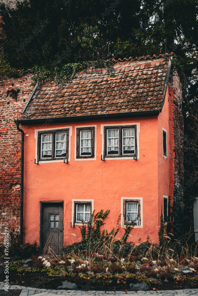 Red old house at the city wall in Memmingen, Bavaria, Germany