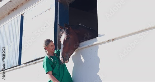 Nurse, woman and horse with care at farm with touch, smile and happy for helping with love. Doctor, veterinary person and equine animal with stroke, kindness or wellness at countryside ranch in Texas photo