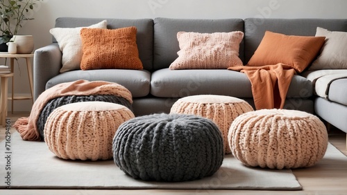 a cute cat in A modern twist on traditional knitting techniques, these poufs add a touch of texture and warmth to the clean lines of a Scandinavian living room, creating a cozy and inviting space photo