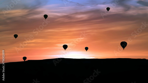 Cappadocia landscape with silhouettes of hot air balloons in the morning sky, Nevsehir, Turkey