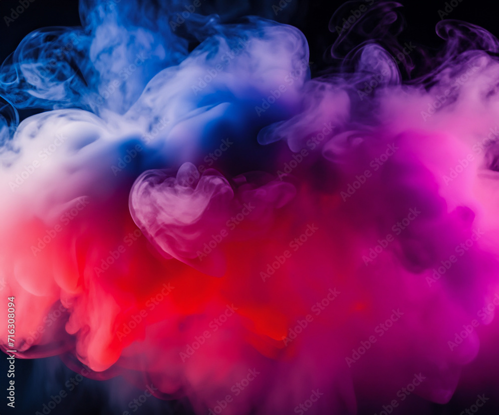 Dramatic smoke and fog in contrasting vivid red, blue, and purple colors. Vivid and intense abstract background or wallpaper.