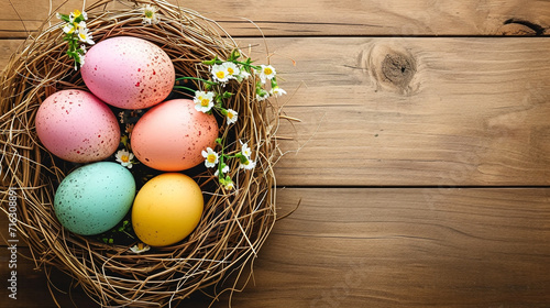 Easter Nest full of Colored egg with wooden Background